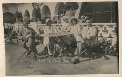 Patrons Sit Near the Pool at Hotel Agua Caliente Spa Postcard
