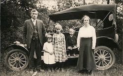 Family in Front of Their Car Postcard