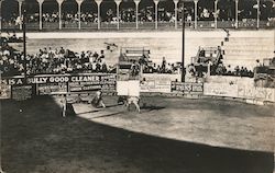 Bull fight in progress in an arena Postcard