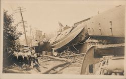 Men Standing Around Destruction and an Overturned Train Postcard