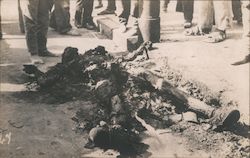Charred Body in the Street - Mexican Revolution Postcard