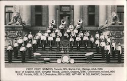 Canadian marching band posing on the steps of a large building Postcard