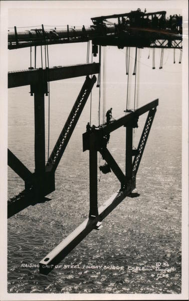 Raising unit of steel to Bay Bridge cable San Francisco California