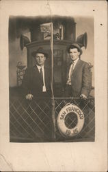 Studio: Two Men on a Boat Postcard