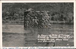 In American river "Coloma". Erected by "Pioneer Mining Ass'n" to mar the spot of where "gold" was discovered... California Postc Postcard