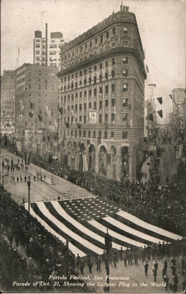 Portola Festival Parade of Oct. 21 showing the largest flag in the world San Francisco California