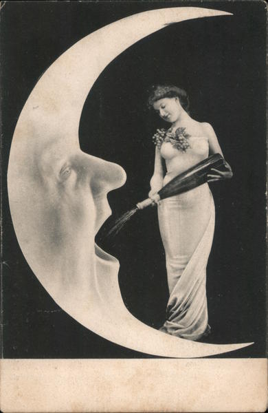 Woman in Elegant Dress with Grapes is Pouring Champagne into a Moon with a Face and Mouth Open