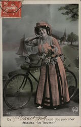 Woman in Pink Dress on bike Postcard