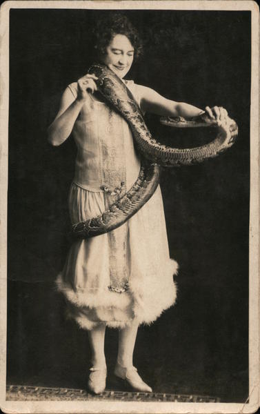 Female Snake Charmer Shows Off Her Snake Circus