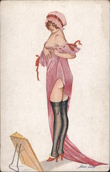 A scantily clad woman looking at herself in a mirror on the ground. Series 20 Postcard