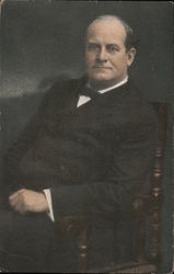 Man Posing for Portrait in Chair Postcard