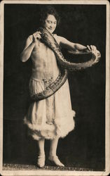Female Snake Charmer Shows Off Her Snake Postcard