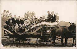 A Large Group in a Large Horse Drawn Carriage Postcard