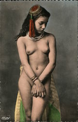 Young naked woman poses with hands crossed looking down Postcard