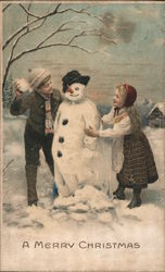 A Merry Christmas - Children Building a Snowman Postcard