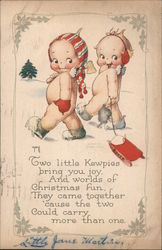 Two Kewpies Pulling a Sled Through the Snow Postcard