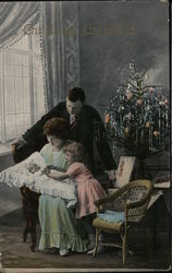 Christmas Greetings - A Family Gathers around a New Baby in Front of the Christmas Tree. Postcard