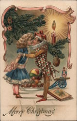 A Doll and a Jester Toy Kiss Under the Christmas Tree Postcard