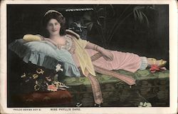 Woman Reclining on Sofa: Miss Phyllis Dare Postcard