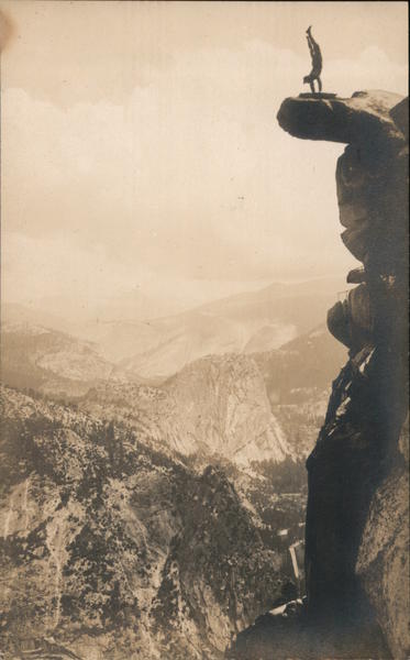 Max Hopper doing handstand on Overhanging Rock at Glacier Point Yosemite Valley California