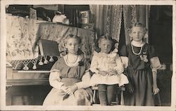 Three Girls Sitting in Front of a Piano, Old Postcard Album Postcard