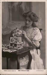 Miss Phyllis Dare Building a House using Postcards of Herself Postcard