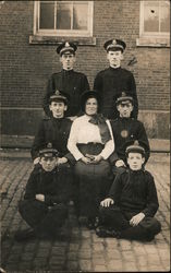 Woman with Men in Salvation Army Uniforms Postcard