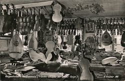 A Man Working in an Instrument Shop Postcard