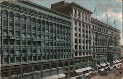 Market Street showing Pacific Building, Commercial Building and the Emporium Postcard