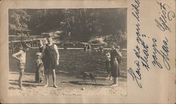 Family on russian river beach with dog. Postcard