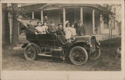 Touring Car Full of Well Dressed Folks Postcard
