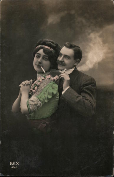Portrait of a couple smoking cigarettes Couples