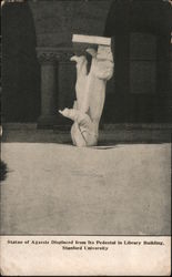 Statue of Agassiz displaced from its pedestal in Library Building, Stanford University Postcard