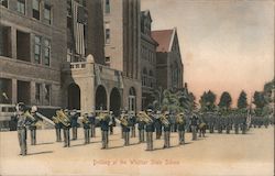 Drilling at the Whittier State School. Band and cadets. Postcard