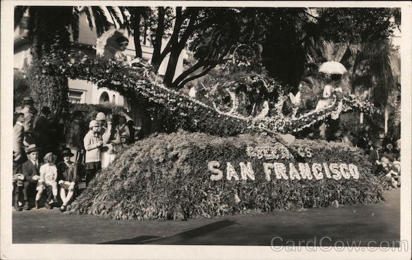 Greetings San Francisco parade float of flowers, women in boat California