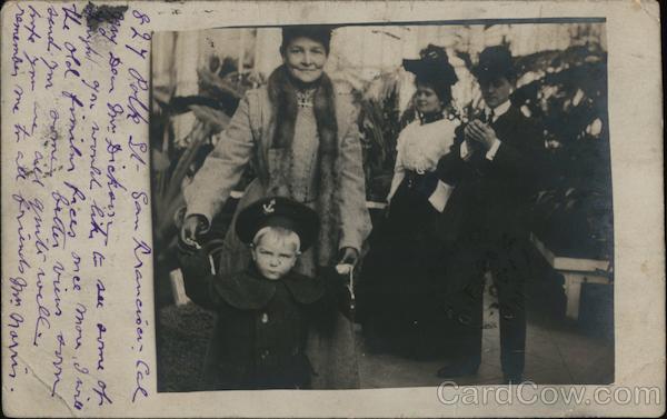 Woman with fur stole and child, couple in background. San Francisco California