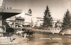 Main street view, cars, parking meters, water hydrant Postcard