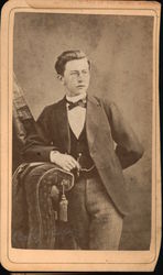 CDV Studio portrait of young man with monocle, watch on fob, string bow tie. Original Photograph