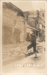 Earthquake damage. Two sailors looking at street rubble. Long Beach, CA Postcard Postcard Postcard