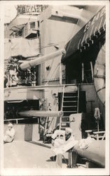 Sailors in dress whites on deck of ship, artillery gun stations Battleships Postcard Postcard Postcard