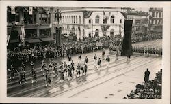 Men Marching Band. Flags and banners on buildings Postcard