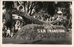 Greetings San Francisco parade float of flowers, women in boat Postcard