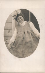 Smiling man wearing a dress Postcard