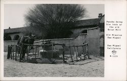 Pancho doing his turn at the old Grist Mill Postcard