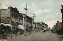 First and Santa Clara Streets - Field & Cole Curio Store Postcard