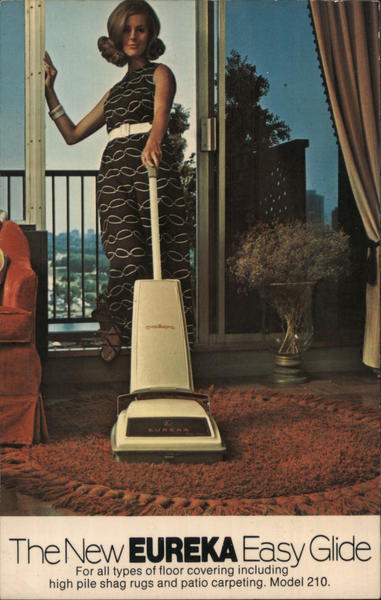 Model 210 Eureka Easy Glide cleaner with Nap Adapts. Woman vacuuming rug.