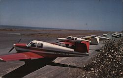 Airport at Shelter Cove. Several planes parked on runway. California Postcard Postcard Postcard