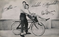 Debbie Reynolds, Vic Damone signed. AMF Roadmaster bike of the stars. Postcard