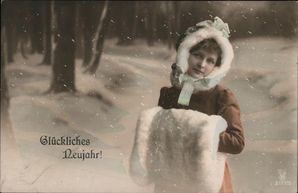 Woman With White Fur Hat And Muff in Snowy Landscape