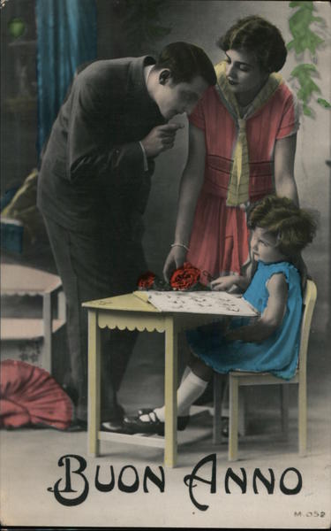 Buon Anno colorized photo man pointing finger at young girl sitting at desk.